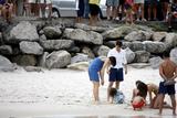 th_06187_Katie_Holmes6_Suri_and_Tom_Cruise_on_the_beach_in_Copa_Cabana_at_Sushi_place_CU_ISA_22_122_745lo.jpg