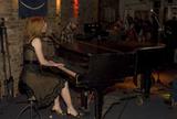 Alicia Witt performing