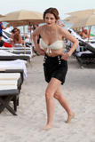 http://img165.imagevenue.com/loc512/th_82162_MischaBarton_OnthebeachinMiami_0060a_122_512lo.jpg