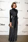 http://img165.imagevenue.com/loc717/th_74860_vodianova_artistsball__02_122_717lo.jpg